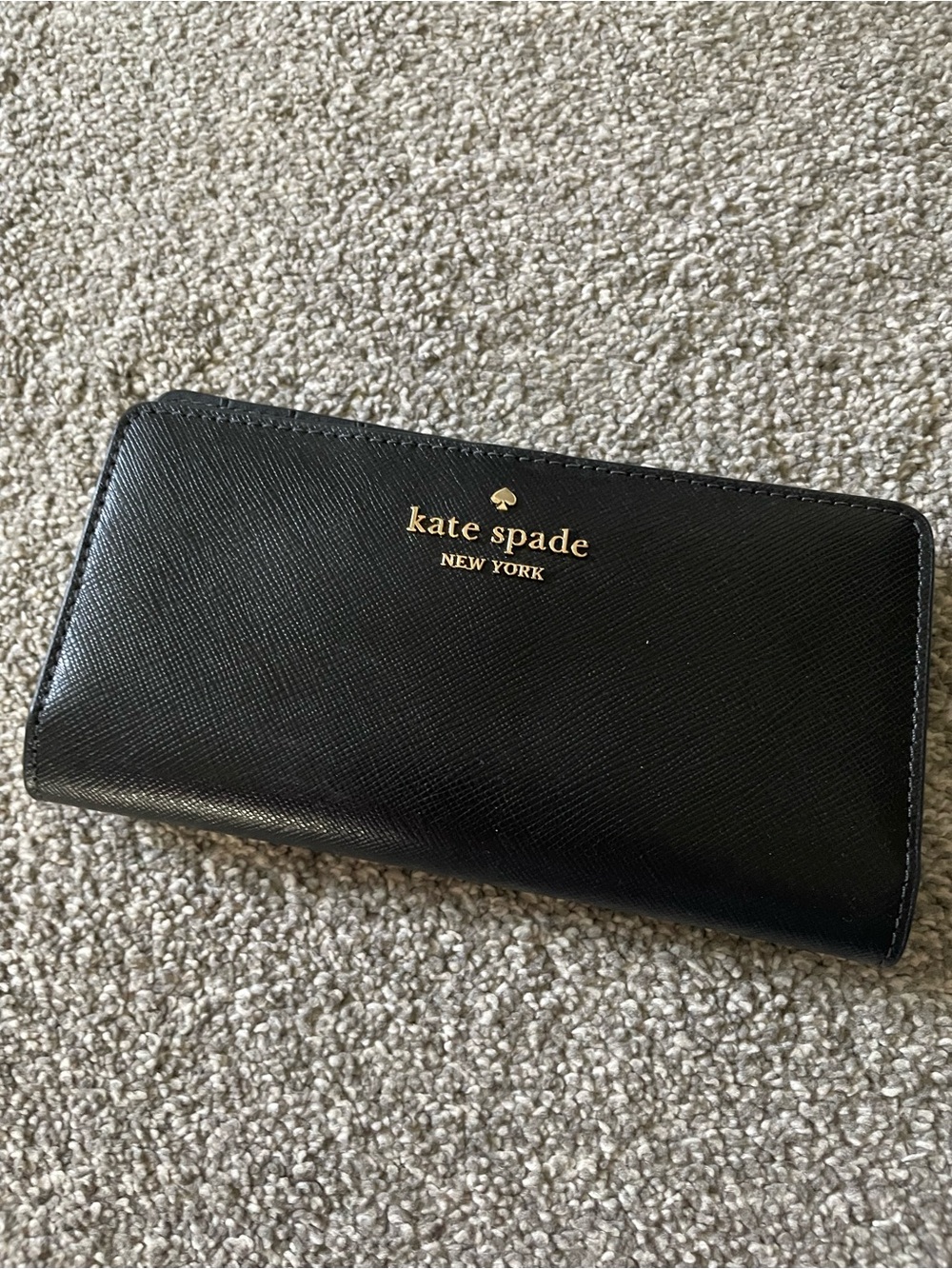 kate spade black continental zip wallet with gold logo